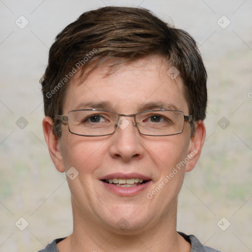 Joyful white adult male with short  brown hair and grey eyes