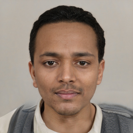 Neutral black young-adult male with short  black hair and brown eyes