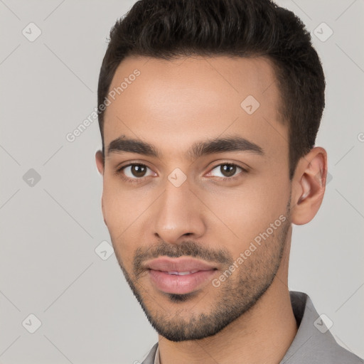 Neutral white young-adult male with short  black hair and brown eyes