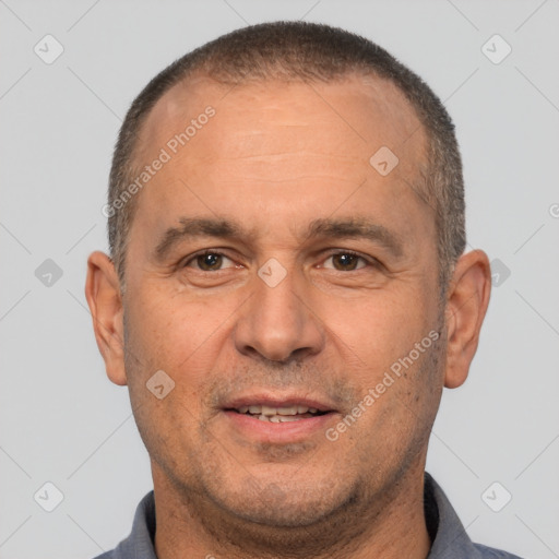 Joyful white adult male with short  brown hair and brown eyes