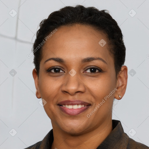 Joyful latino young-adult female with short  brown hair and brown eyes