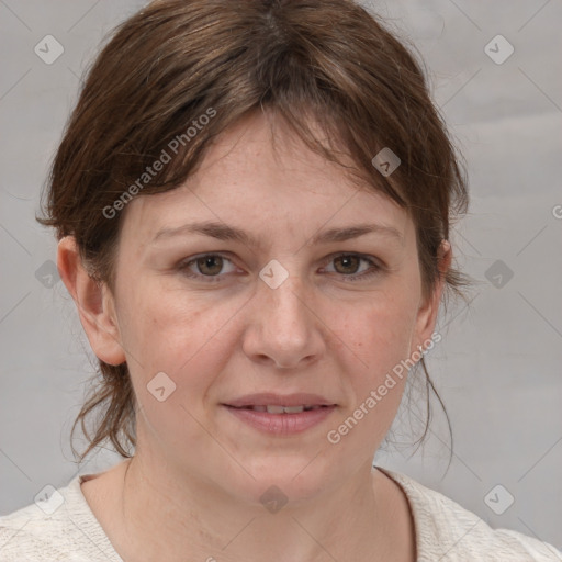 Joyful white adult female with medium  brown hair and blue eyes