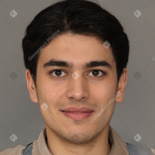 Joyful latino young-adult male with short  brown hair and brown eyes