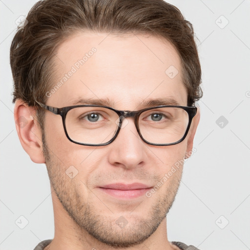 Joyful white adult male with short  brown hair and grey eyes