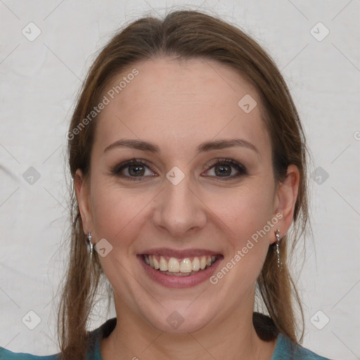 Joyful white young-adult female with medium  brown hair and grey eyes