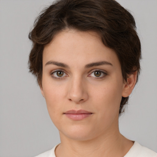 Neutral white young-adult female with short  brown hair and brown eyes