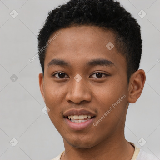 Joyful black young-adult male with short  black hair and brown eyes