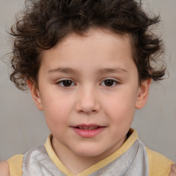 Joyful white child male with short  brown hair and brown eyes