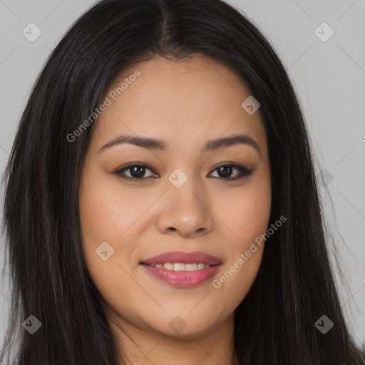 Joyful asian young-adult female with long  brown hair and brown eyes