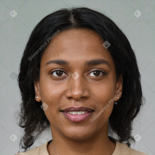 Joyful black young-adult female with medium  black hair and brown eyes