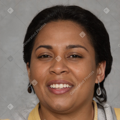 Joyful latino adult female with short  brown hair and brown eyes