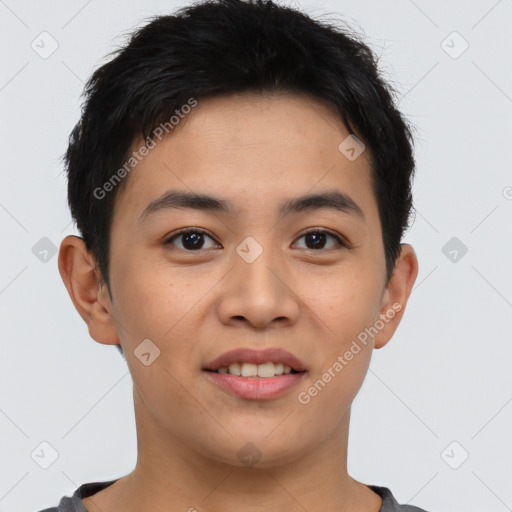 Joyful asian young-adult male with short  brown hair and brown eyes
