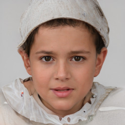 Joyful white child female with short  brown hair and brown eyes