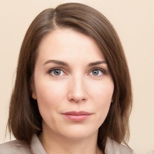 Neutral white young-adult female with medium  brown hair and grey eyes