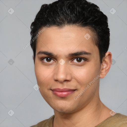 Joyful white young-adult male with short  black hair and brown eyes