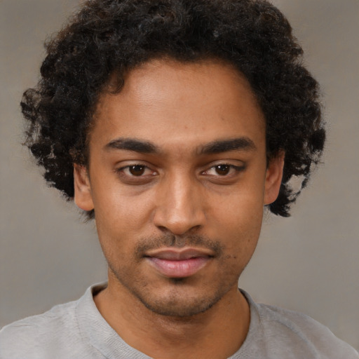 Neutral black young-adult male with short  brown hair and brown eyes
