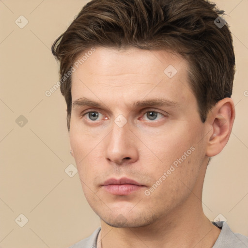 Neutral white young-adult male with short  brown hair and brown eyes