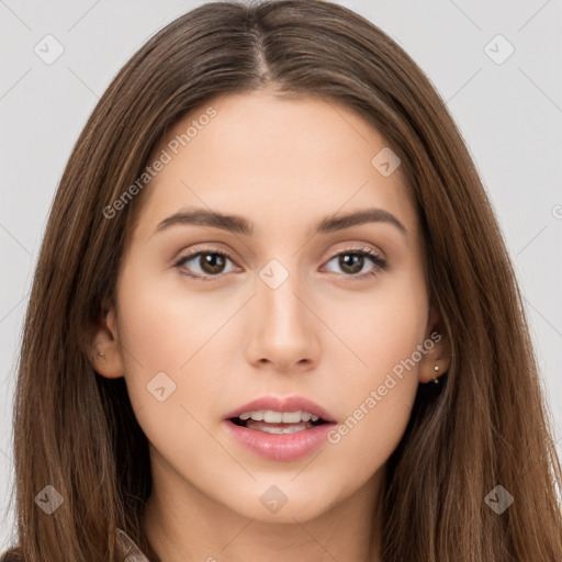 Neutral white young-adult female with long  brown hair and brown eyes