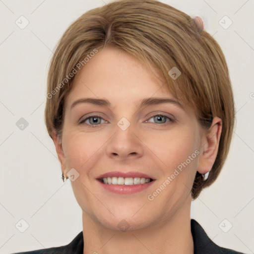 Joyful white young-adult female with medium  brown hair and grey eyes