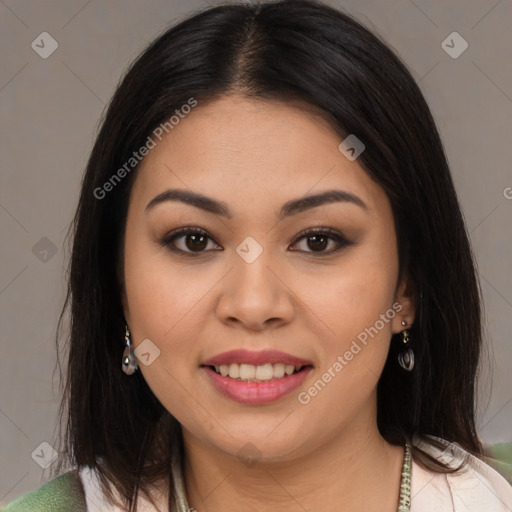 Joyful latino young-adult female with medium  brown hair and brown eyes