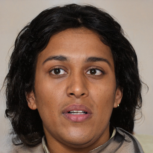 Neutral asian young-adult female with medium  brown hair and brown eyes