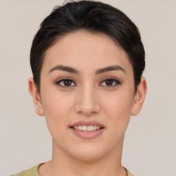 Joyful asian young-adult female with short  brown hair and brown eyes