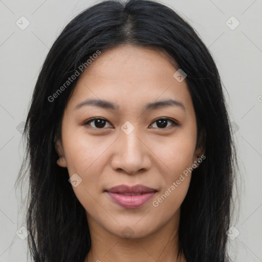 Joyful latino young-adult female with long  brown hair and brown eyes