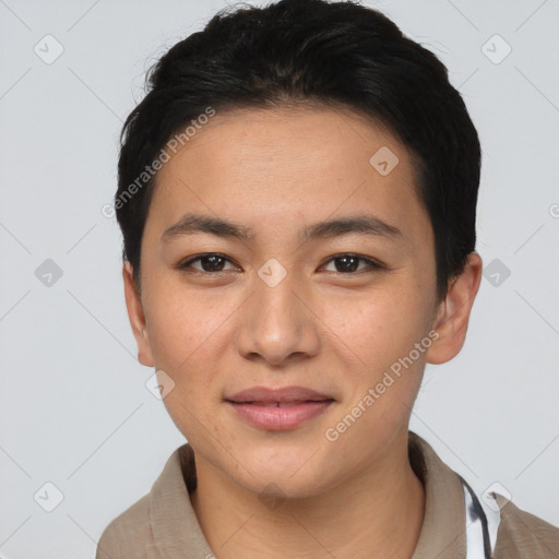 Joyful asian young-adult female with short  black hair and brown eyes