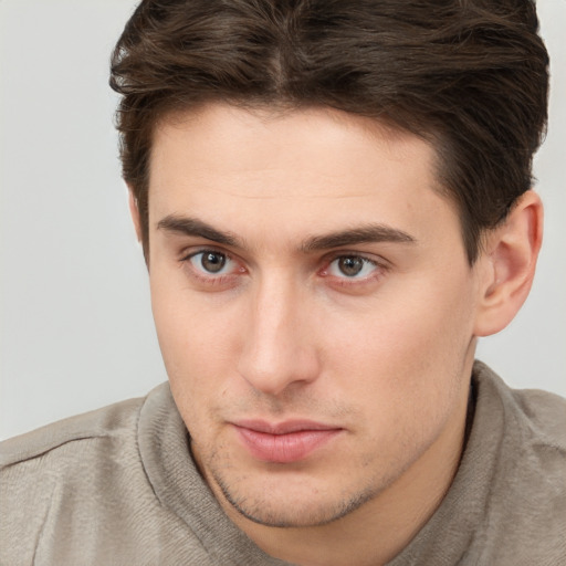 Neutral white young-adult male with short  brown hair and brown eyes