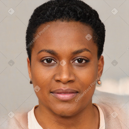 Joyful black young-adult female with short  black hair and brown eyes