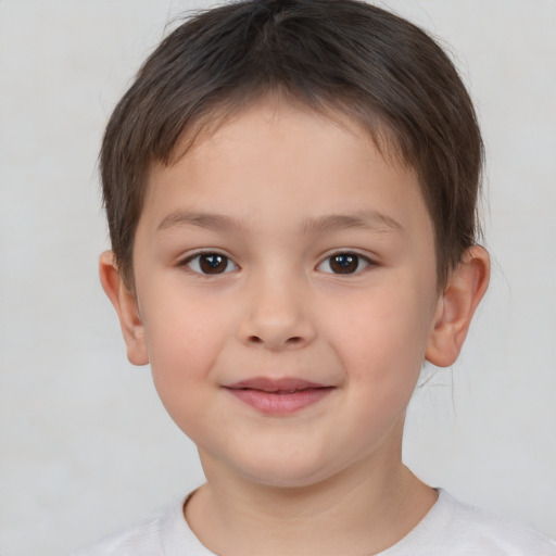 Joyful white child female with short  brown hair and brown eyes