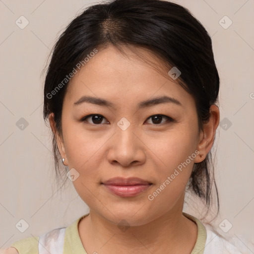 Joyful asian young-adult female with medium  brown hair and brown eyes