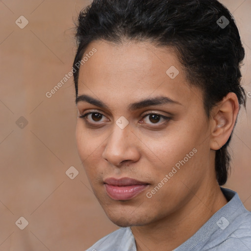 Joyful latino young-adult female with short  brown hair and brown eyes