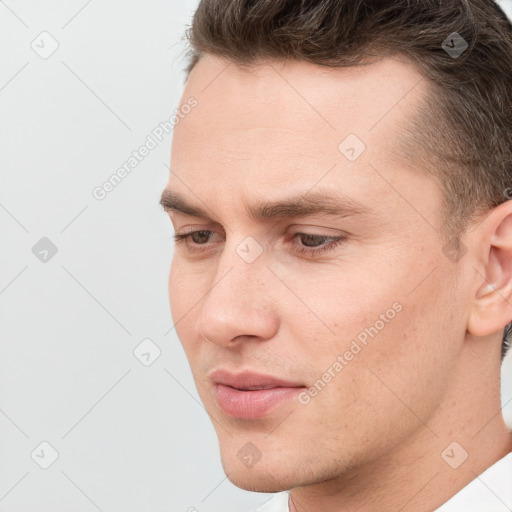 Neutral white young-adult male with short  brown hair and brown eyes