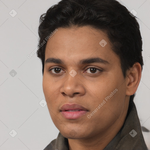 Joyful latino young-adult male with short  black hair and brown eyes