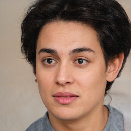 Joyful white young-adult male with medium  brown hair and brown eyes