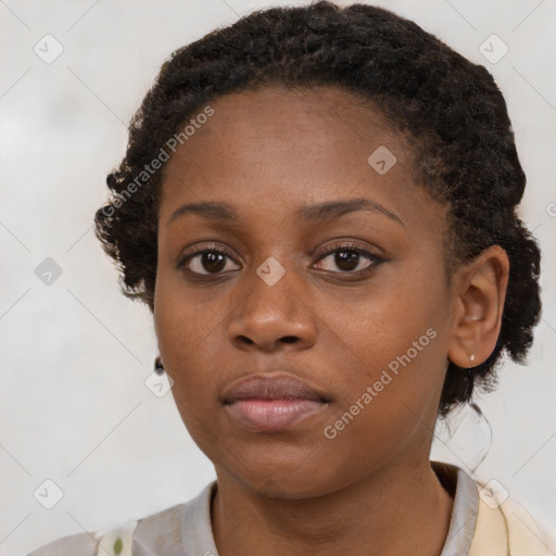 Neutral black young-adult female with short  brown hair and brown eyes