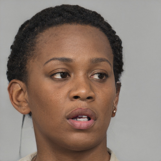 Neutral black young-adult female with short  brown hair and brown eyes
