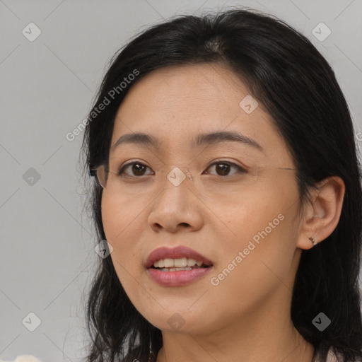 Joyful asian young-adult female with medium  brown hair and brown eyes