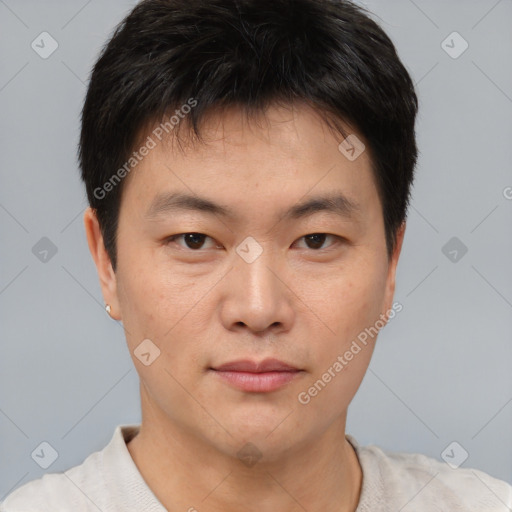 Neutral asian young-adult male with short  brown hair and brown eyes