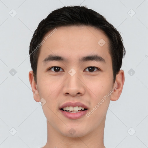 Joyful white young-adult male with short  black hair and brown eyes