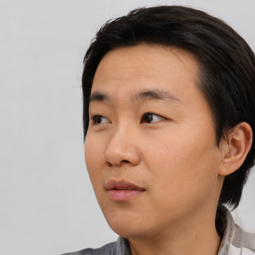 Neutral asian young-adult male with medium  black hair and brown eyes