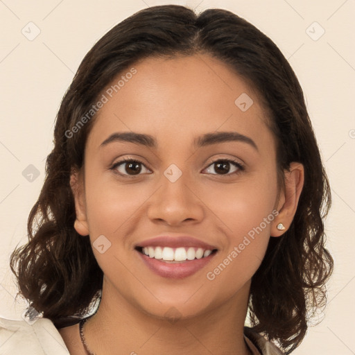 Joyful white young-adult female with long  brown hair and brown eyes