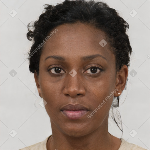 Neutral black young-adult female with short  brown hair and brown eyes