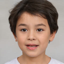 Joyful white child female with short  brown hair and brown eyes