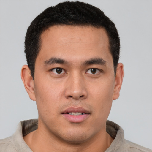 Neutral latino young-adult male with short  brown hair and brown eyes