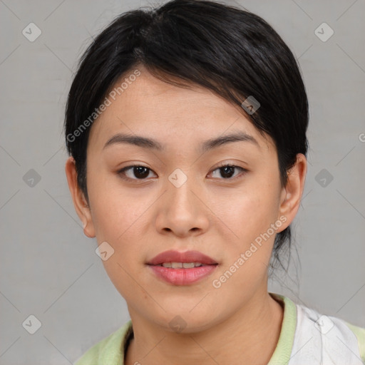 Joyful asian young-adult female with short  brown hair and brown eyes