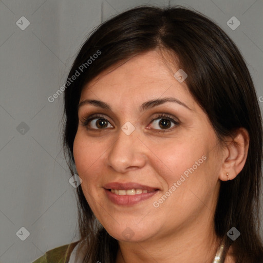 Joyful white adult female with medium  brown hair and brown eyes