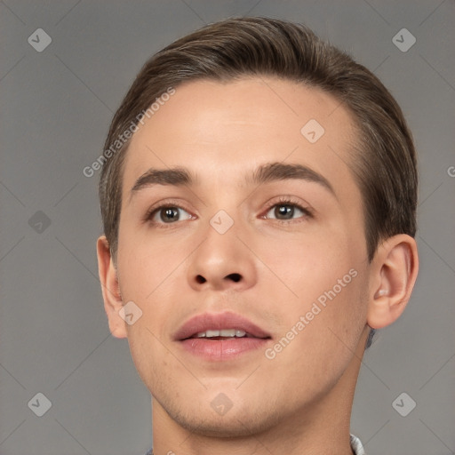 Joyful white young-adult male with short  brown hair and brown eyes