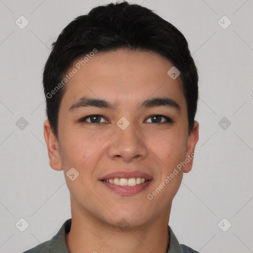 Joyful asian young-adult male with short  brown hair and brown eyes